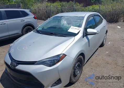 2018 Toyota Corolla Le from USA, damaged, VIN 2T1BURHE3JC989565